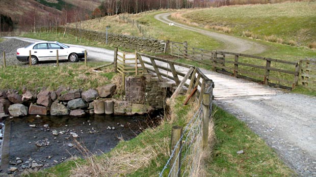 View of the start of the route - at the gate on the far side of the bridge opposite the car.