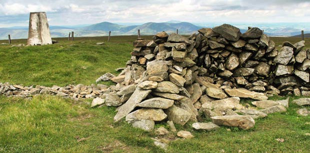 The trig point on Dollar Law with the Culters beyond.