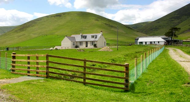 Glenkirk house with Congrie Hill and Chapelgill Hill beyond.