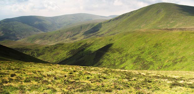 View from the top of Chapelgill Hill over the cleuch of Hope Burn to Culter fell and Gathersnow Hill.