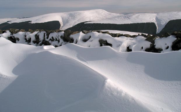 Snow sculptures on Smidhope Hill with Ettrick Pen beyond