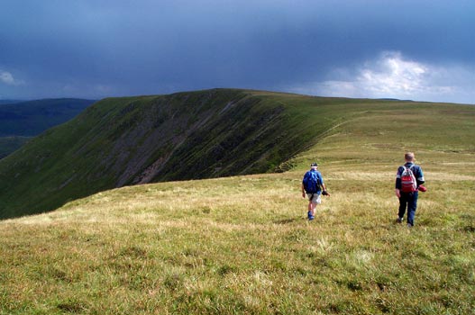 Top picture shows the flat top of Swatte Fell and the lower picture shows Saddle Yoke as we descend from Black Craig