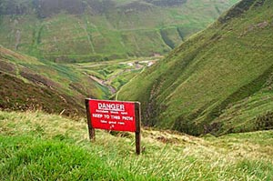 View back to car park at Grey Mare's Tail with sign saying you must keep to the path