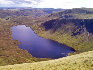 View down onto Loch Skene from the top of Lochcraig Head