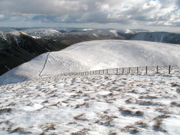 Looking down into Hass 'O the Red Roads from above Hartfell Craig.