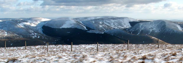 View of the Ettrick hills from the Black Craig in the Moffat hills with names of hills to be seen.