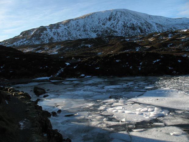 Looking across to White Coomb from where the Tail Burn runs out of Loch Skene.