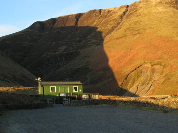 Evening light on the visitors centre at Grey Mare's Tail from the car park.