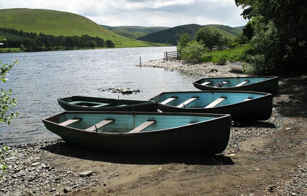 Boats on the shore of St Mary's Loch at Rodono House.