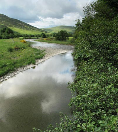 View looking south west as you cross the bridge over the Tweed at Stanhope.