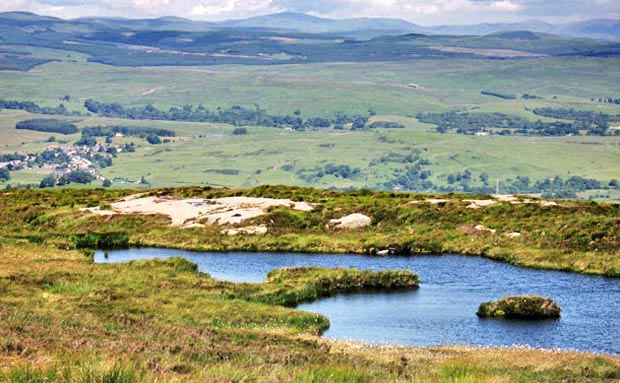 Looking north east over the lochans to St John's Town of Dalry.