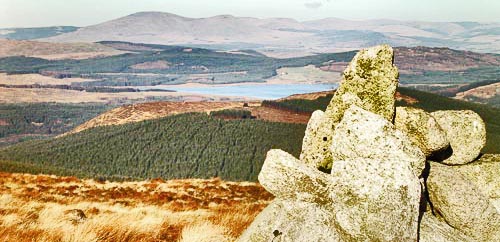 From the cairn above Craigronald looking north over Clatteringshaws to Cairnsmore of Carsphairn.