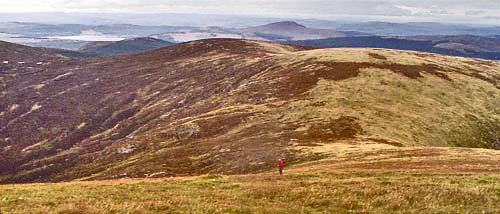 View from ascent of Cairnsmore of Fleet towards Nick of the Saddle with Meikle Mulltaggart behind and Craigronald beyond that