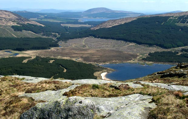 View down over Loch Dee to Clatteringshaws and Cairnsmore of Dee beyond
