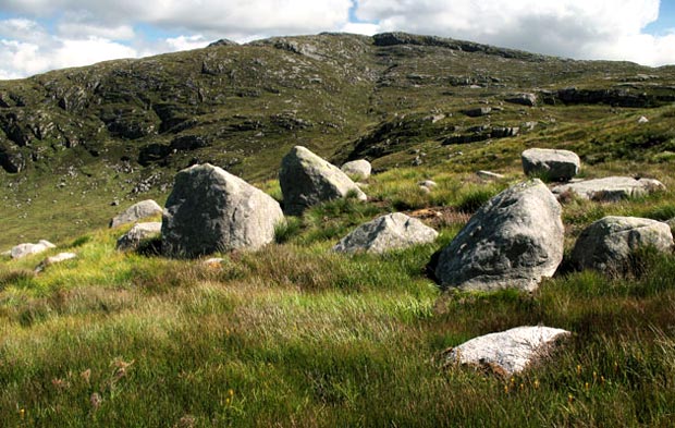 View looking towards the top of Craignaw with erratic boulders