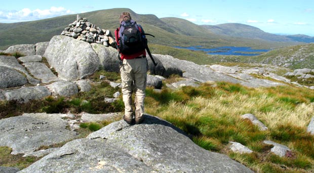 Small cairn on top of the solid bedrock on the summit of Craignaw
