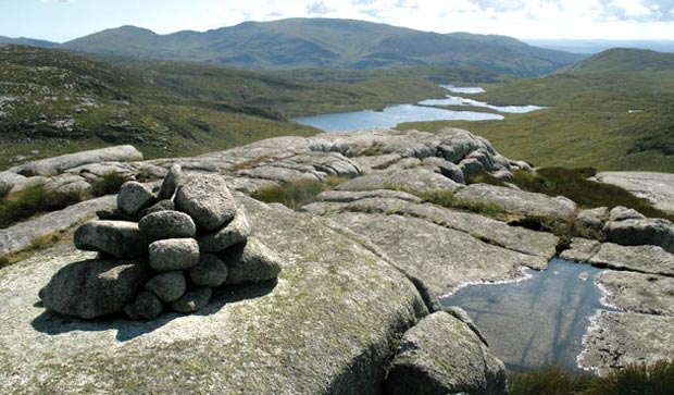 Looking over Loch Neldricken and Loch Valley towards the Gairland Burn Valley and the Minnigaff Hills