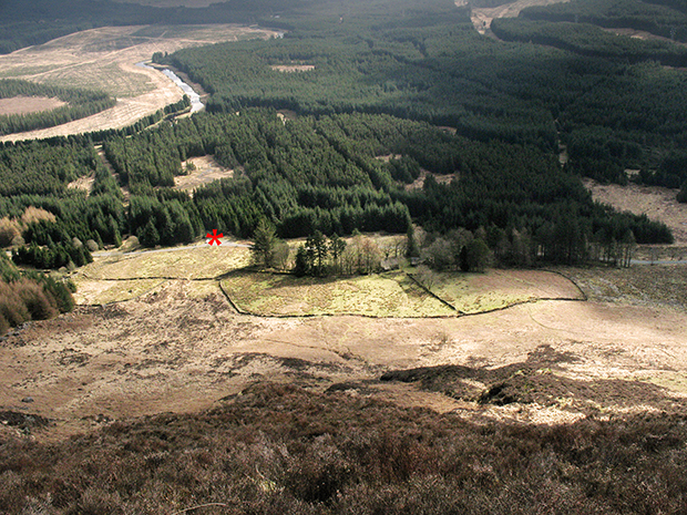 View of the car park area at Craigencallie from above crags on Cairngarroch