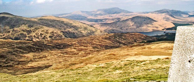 View from the trig point on Millfore of the Silver Flowe and the three ranges of the Galloway Hills