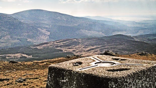 View of Cairnsmore of Fleet and Wigtown Bay from the trig point on Millfore