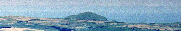 Detail showing Knockdolian and the Antrim coast as seen from the top of Bennan