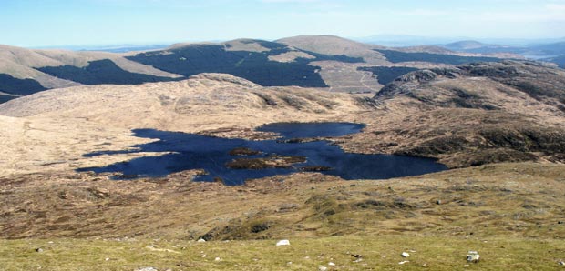View over Loch Enoch, Dungeon Hill and Craignaw  looking eastward to Meikle Millyea in the Rhinns of Kells from the top of the Merrick
