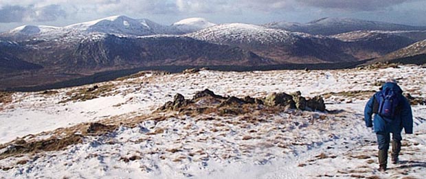 Heading from Millfire to Corserine with a view of the Dungeon Hills and the Awful Hand range beyond