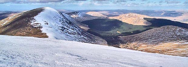 View northwards from Corserine over Carlin's Cairn up into Ayrshire