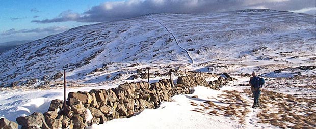 Coming off Milldown with Meikle Millyea ahead and the frozen lochans of Auchniebut in the saddle