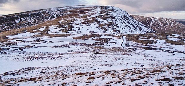 Looking back from the saddle to Milldown