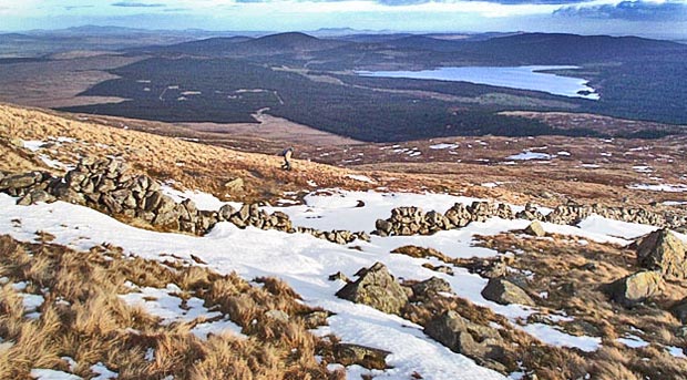 Coming down off Meikle Millyea with Clatteringshaws Reservoir and Cairnsmore of Dee