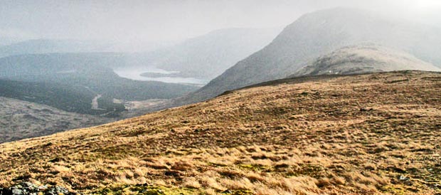 Heading towards Millfire from Corserine with Loch Dungeon showing through mist