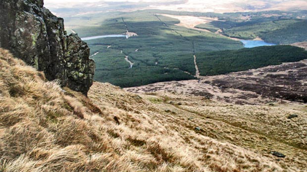 View of the route ahead into the forest as we descend from Polmaddy Gairy