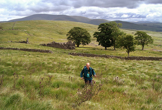 Looking back towards the derelict mine buildings as we start our day's climb