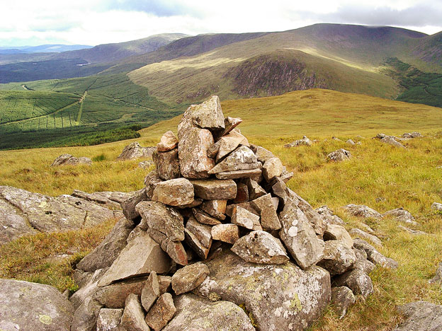 View from the top of Cairnsgarroch towards the dark face of Craignelder on Polmaddy Gairy