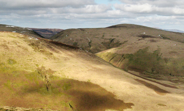 View of the saddle between Lousie Wood Law and White Law from Faugh