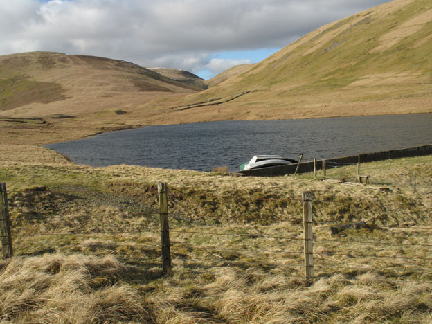 View looking up Peden reservoir to the saddle between Lousie Wood Law and White Law.