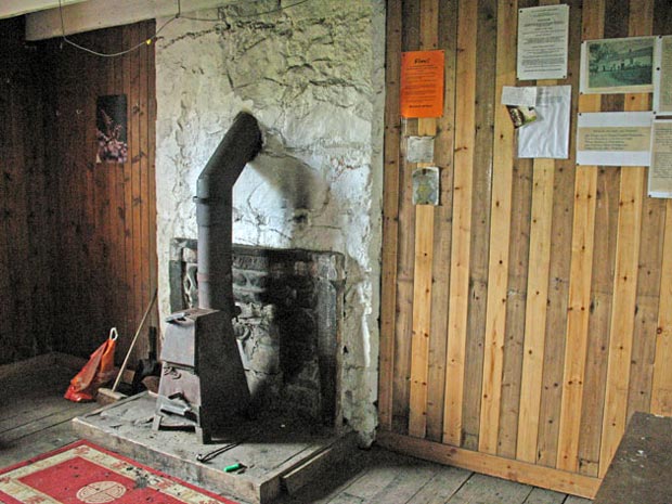 Interior of Burleywhag bothy showing the stove area