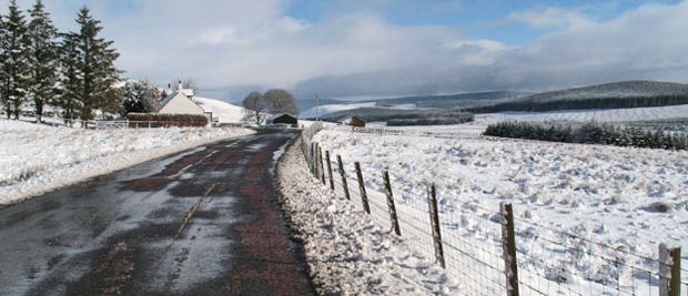 Looking east along the A702 towards the parking place at Overfingland