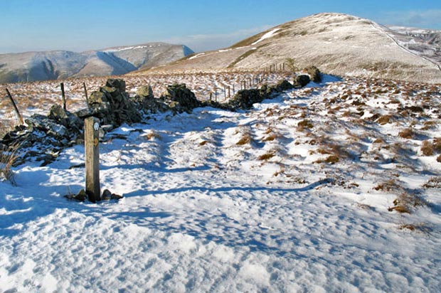 View of the route ahead from the top of Laght Hill to Comb Head