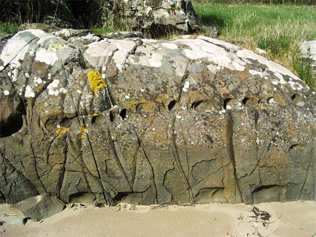 Rocks around with interesting holes in them on Ardwall Island beach