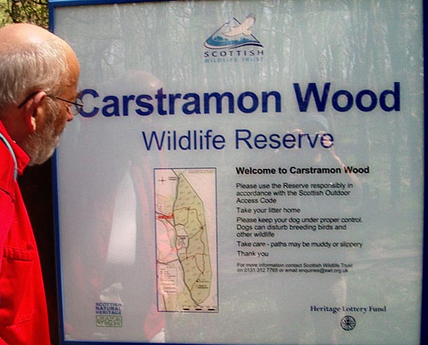 Information board with walking routes in Castramont Wood