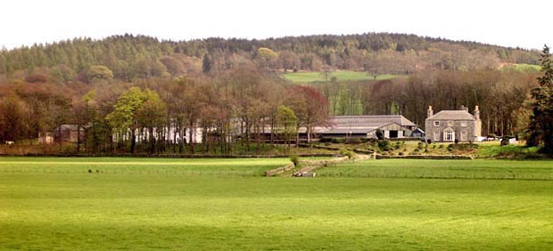 View towards Cally Mains farm as we walk along the embankment towards Gatehouse