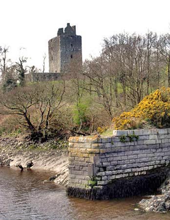 Cardoness Castle with some of the old port structures in the foreground