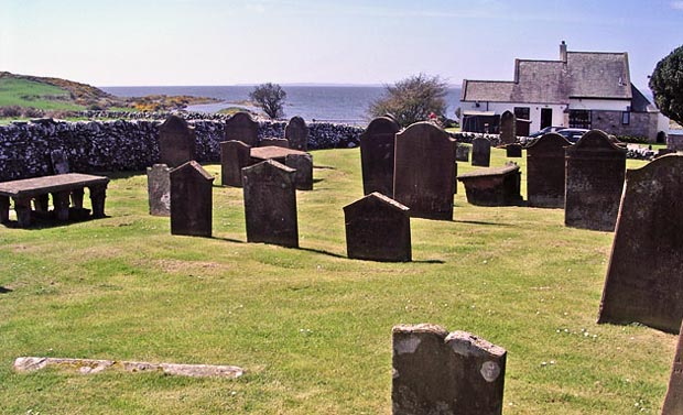 View of the graveyard at Kirkandrews with Solway Firth beyond it