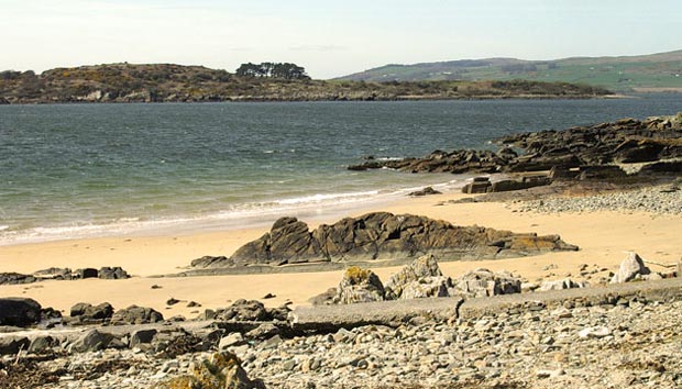 View towards Ardwall Isle from the sandy beach near Point of the Bar