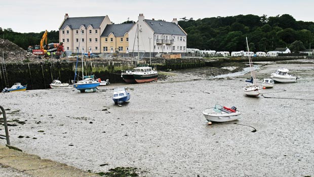 View on new flats being built around the harbour at Garlieston