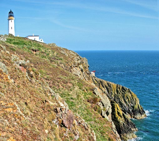 View of lighthouse and fog horn at the Mull of Galloway