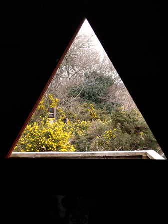 Triangular window in the hide at Castle Wood Caerlaverock
