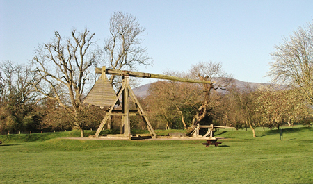 Looking west towards Criffel beyond the siege engines at Caerlaverock Castle